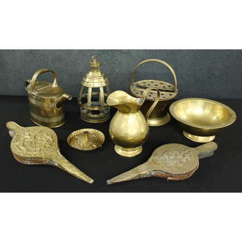 1269 - Assorted brassware to include a wash jug and basin, watering can, flower holder, lantern, bellows et... 