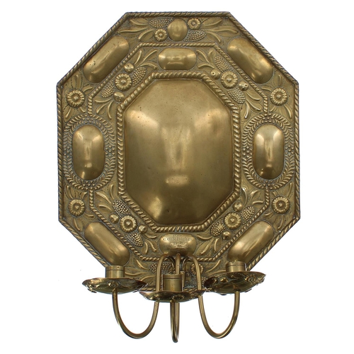 1003 - Dutch 19th century repoussé brass wall sconce, the rectangular back plate with canted corners, decor... 