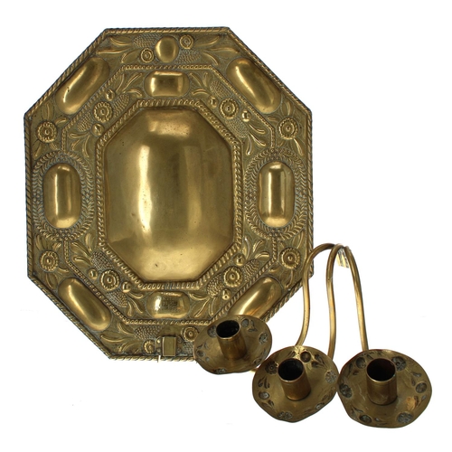 1003 - Dutch 19th century repoussé brass wall sconce, the rectangular back plate with canted corners, decor... 