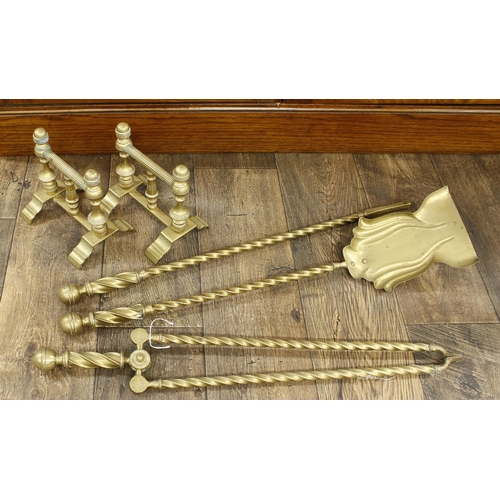 1221 - Pair of Victorian brass andirons with fluted and turned supports, 7.25” high; together with a set of... 