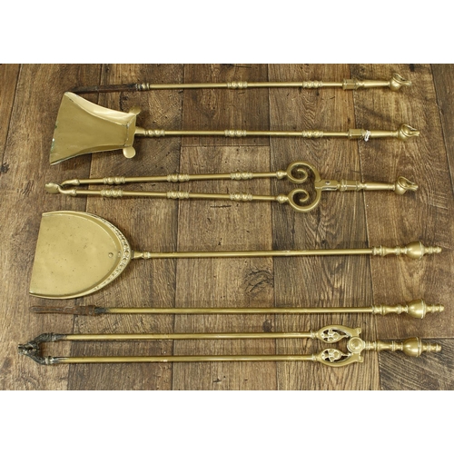 1168 - Two similar sets of Victorian brass fire irons (6)