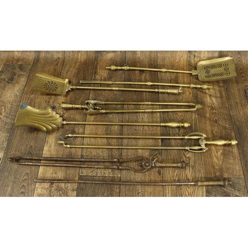 1210 - Four assorted 19th century pairs of fire irons, including three brass examples and a steel pair (8)... 