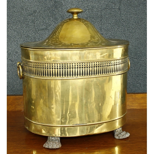 1207 - Oval Neoclassic style polished brass log bin and cover, with a pierced band, side carry-handles and ... 