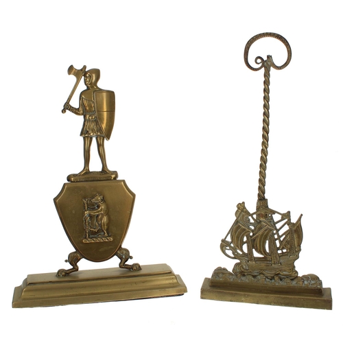 1013 - 19th century brass and iron doorstop modelled with a soldier in a suit of armour over a bear shield ... 