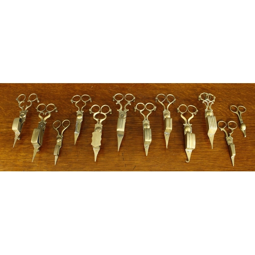 1142 - Collection of 18th and 19th century pairs of brass candle snuffers (12)