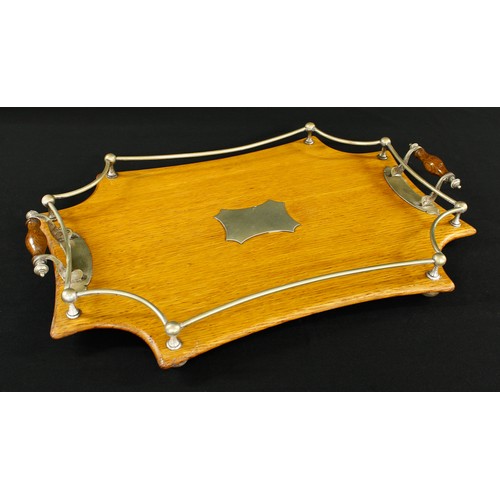 1009 - Early 20th century golden oak and silver plated twin-handled gallery tray, the plated mount stamped ... 