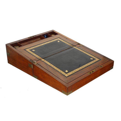 1226 - Victorian walnut brass bound writing slope, the fitted interior inset with two glass inkwells, 14” w... 