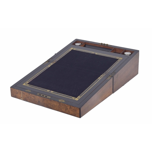 1148 - Victorian burr walnut writing slope, the ebonised fitted interior with two square glass inkwells, 14... 