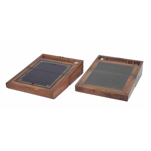 1041 - Two Victorian walnut writing slopes, each with fitted interior and inset with glass inkwells, 13.7” ... 