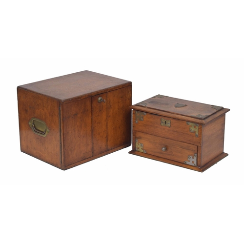 1227 - Early 20th century oak table cabinet, the double doors enclosing two drawers, with recessed brass si... 