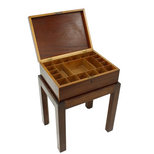 1179 - 19th century mahogany workbox upon a later stand, with boxwood banding and a fitted interior, the bo... 