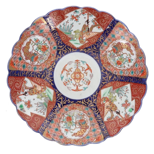 1570 - 19th Century Japanese Imari porcelain circular charger, decorated in typical palette with gilded hig... 