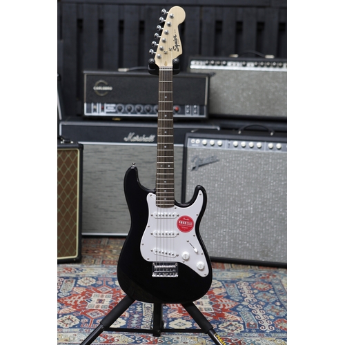 617 - 2023 Squier by Fender Mini Stratocaster electric guitar, black finish, with original box and packagi... 