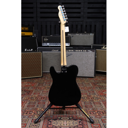 621 - Squier by Fender Bullet Telecaster electric guitar, black finish, large impact blemish to treble edg... 