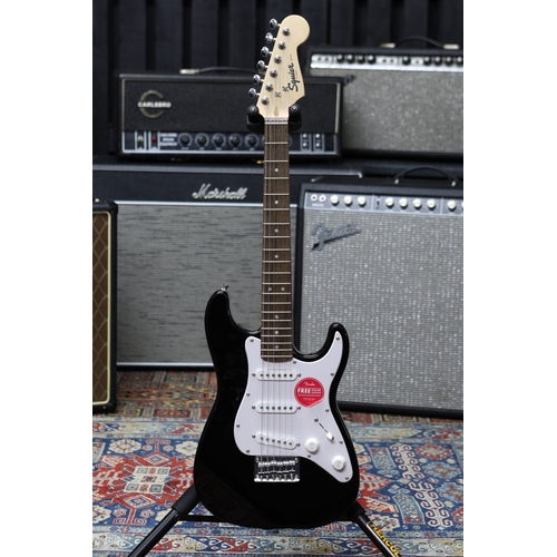 629 - 2021 Squier by Fender Mini Stratocaster electric guitar, black finish, with original shipping box (n... 