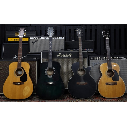 766 - Four steel string acoustic guitars in various states of repair to include a Yamaha F-310, a Cort SFX... 