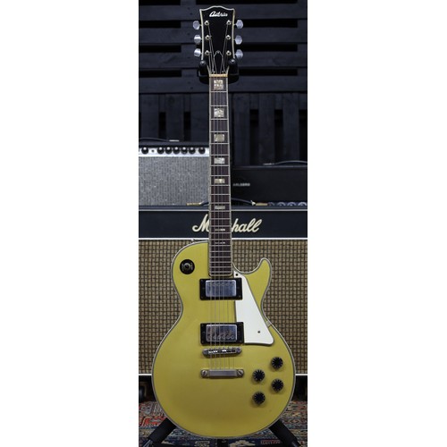 834 - 1970s Antoria LP type electric guitar, made in Japan; Finish: gold top, blemishes to edges, scratche... 