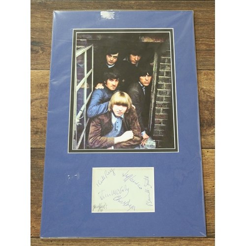 592 - The Yardbirds - autographed page including Jeff Beck, mounted below a colour picture of the band*Fro... 