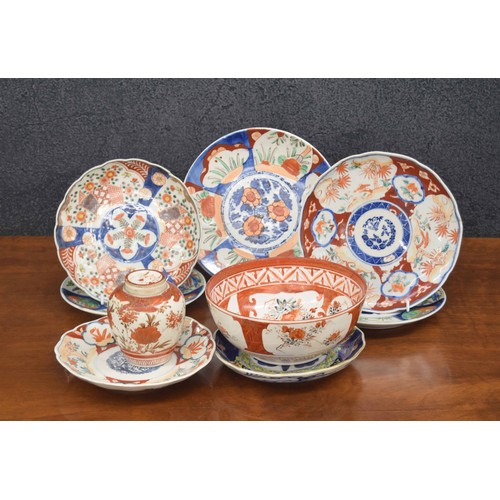 1572 - Three 19th century Japanese Imari pattern circular fluted rim porcelain plates, 8.5