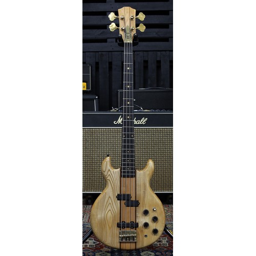 855 - 1980s Kay bass guitar, made in Japan; Body: natural finish (refinish); Neck: maple; Fretboard: ebony... 