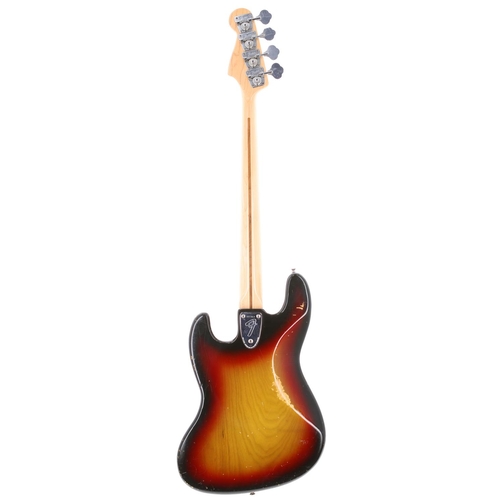 29 - 1976 Fender Jazz Bass guitar, made in USA; Body: three-tone sunburst finish, buckle blemish to back,... 