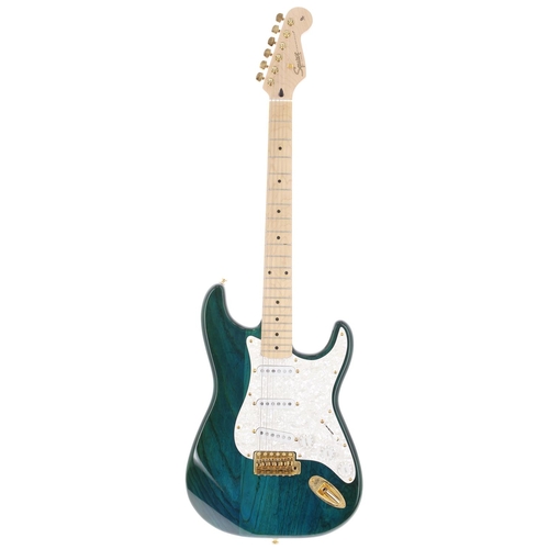 75 - 1997 Squier by Fender Pro Tone Series Stratocaster electric guitar, made in Korea; Body: trans green... 