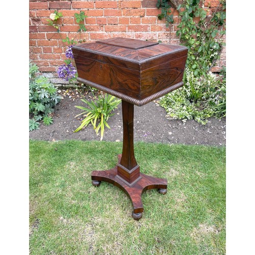 1770 - Victorian rosewood teapoy of sarcophagus form with gadroon moulding and inset with a pull-out compar... 