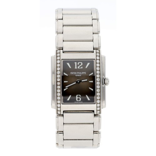 40 - Patek Philippe Twenty-4 stainless steel lady's wristwatch, reference no. 4910/1200A-010, grey sunbur... 