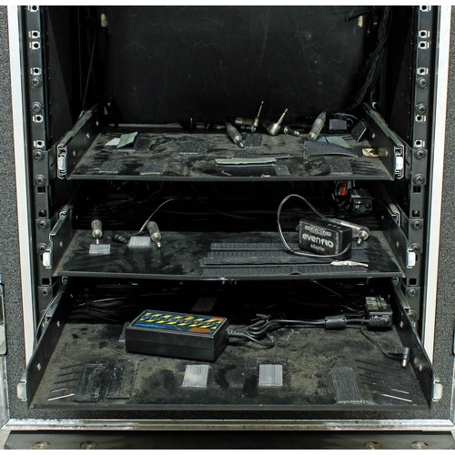 565 - The Script - heavy duty rack flight case on wheels enclosing an arrangement of pull-out shelving uni... 