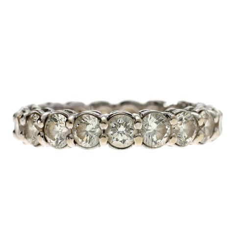 95 - Impressive white metal diamond full eternity ring, estimated 3.80ct approx in total, width 4mm, 4.5g... 