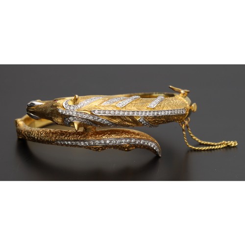 136 - Fine high grade yellow gold diamond set horse design hinged bangle, with gem set eyes, safety chain,... 