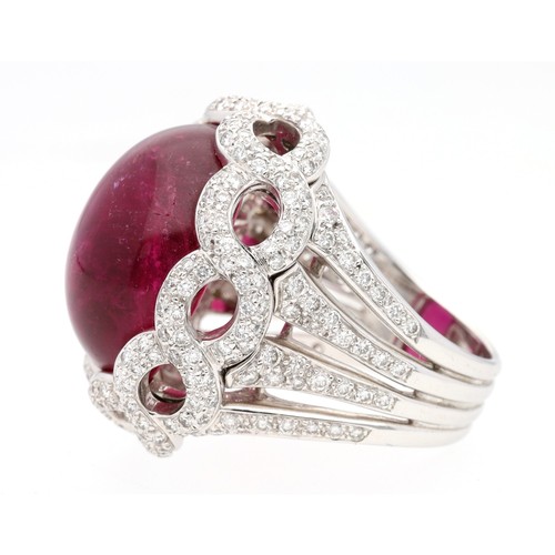 137 - Large fancy 18ct white gold cabouchon ruby and diamond ring dress ring, width 25mm, 19.1gm, ring siz... 