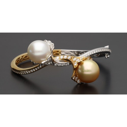 138 - Good 18ct bicolour pearl and diamond bangle, the pearls each 13.5mm, round brilliant-cut diamonds, 3... 