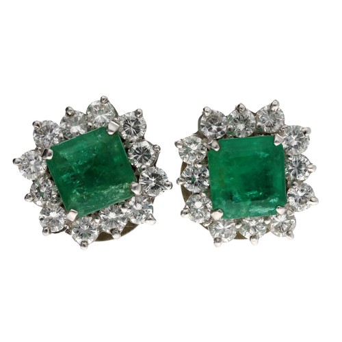 153 - Pair of white gold emerald and diamond square cluster earrings, the emeralds each 1.10ct approx, rou... 