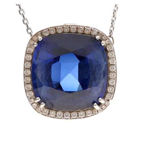 157 - Impressive large 18ct white gold synthetic sapphire and diamond pendant on a slender necklace, the p... 