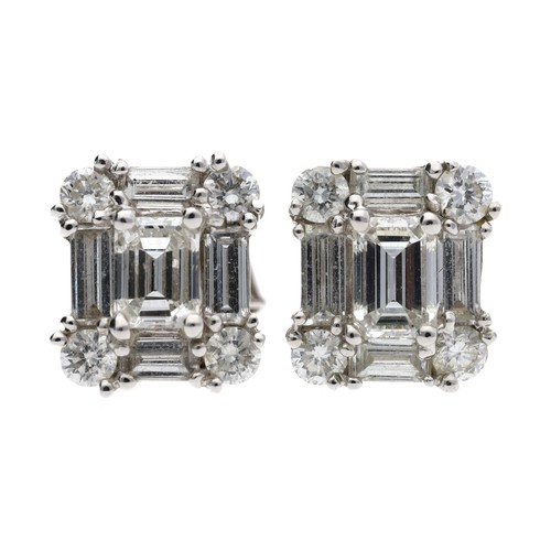 63 - Pair of modern 18ct white gold baguette and round-cut diamond stud earrings, post and butterfly back... 