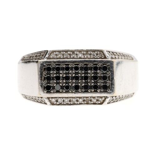 70 - 14ct white gold white and black diamond set ring, width 11mm, 12.1gm, ring size U (ref.30)... 