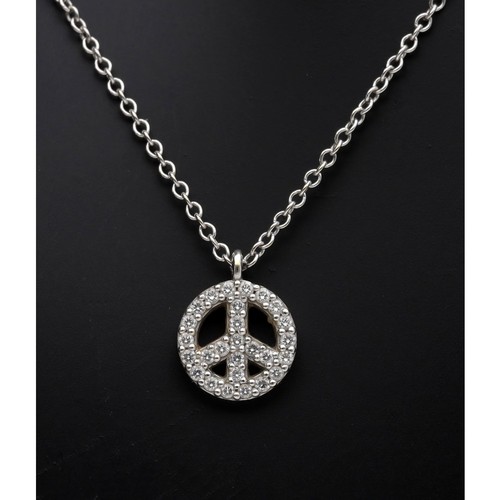 79 - Tiffany & Co 18ct white gold diamond Peace sign pendant on necklace, 2gm (ref.39)... 