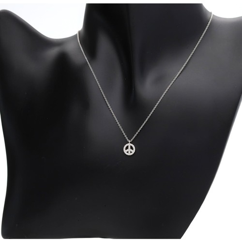 79 - Tiffany & Co 18ct white gold diamond Peace sign pendant on necklace, 2gm (ref.39)... 