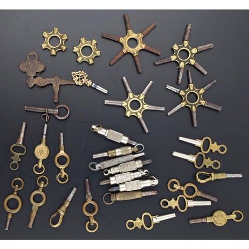 119 - Assortment of pocket watch keys to include four spider keys (two with one missing key); two spider k... 