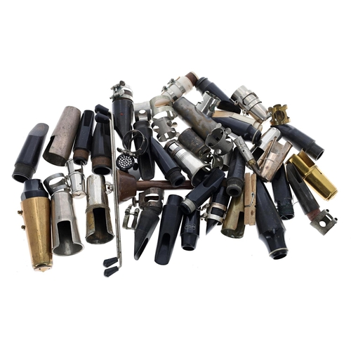 1869 - Large quantity of bass saxophone mouthpieces, various other clarinet and saxophone mouthpieces; also... 