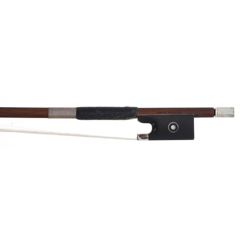 2235 - German silver mounted violin bow stamped Heinz Dolling, the stick octagonal, the ebony frog inlaid w... 