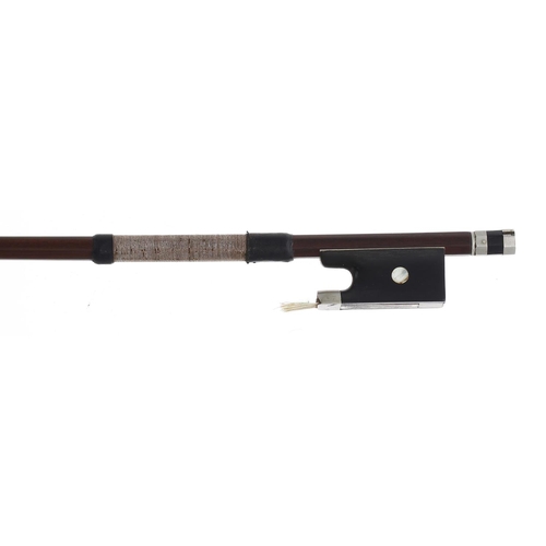 2245 - 19th century nickel mounted French violin bow, the stick round, the ebony frog inlaid with pearl eye... 