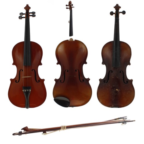 2053 - Three full size violins and four violin bows one stamped C.D...