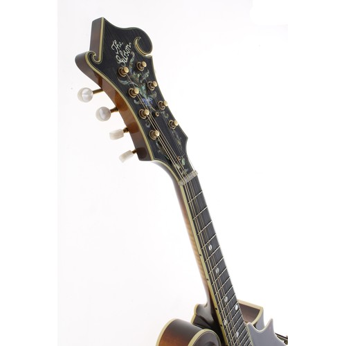 1561 - Fine Gibson F-L style mandolin, ser. no. 00107010, bearing the Gibson master model label; also beari... 