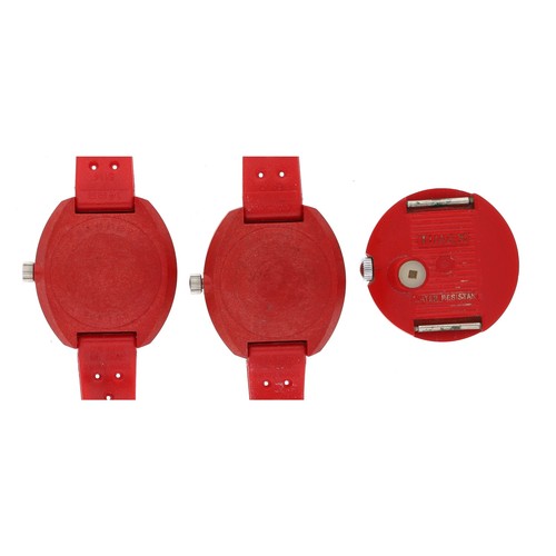 404 - Two Sandoz wristwatches (one for repair) together with a Timex wristwatch, with red plastic cases an... 