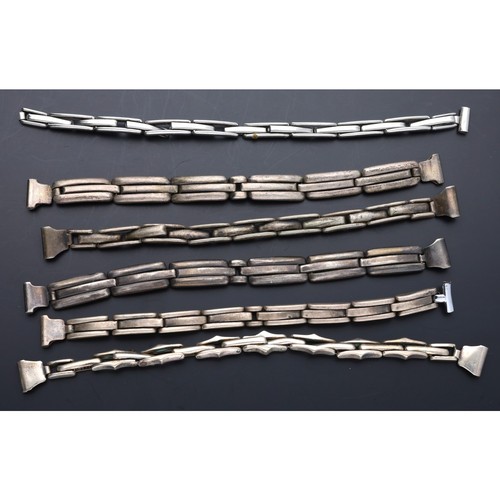 466 - Four silver expanding wristwatch bracelets; together with two white metal expanding wristwatch brace... 