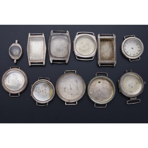 474 - Quantity of silver wire and swing lug wristwatch cases; together with a silver lady's wristwatch cas... 