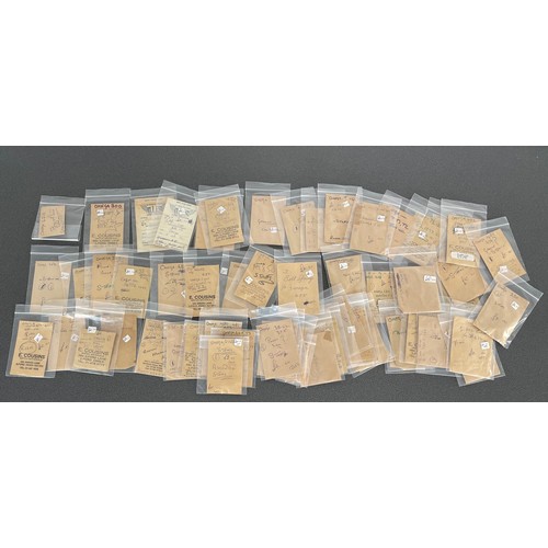 446 - Omega - Quantity of assorted Omega watch parts to include bolt spring, stems, staffs, spring, washer... 