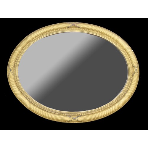 1605 - Victorian oval giltwood and gesso wall mirror, the reeded cushion frame with beadwork and egg and da... 